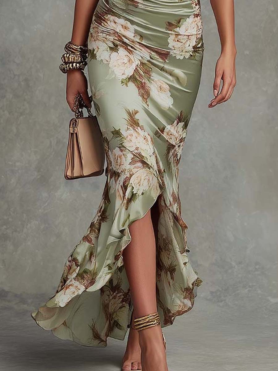 Anne | Abito lungo asimmetrico in satin verde con scollatura a V, maniche a sbuffo e stampa floreale