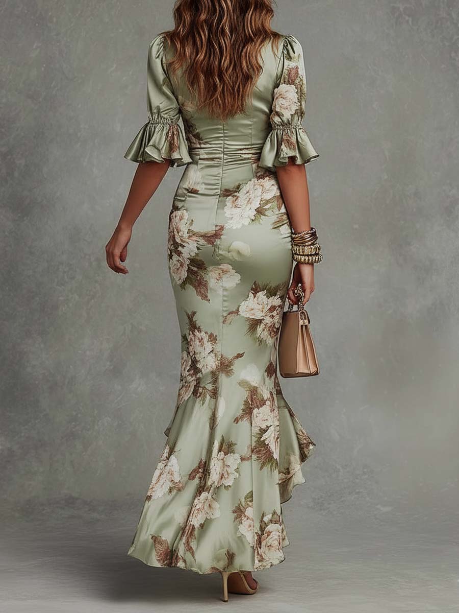 Anne | Abito lungo asimmetrico in satin verde con scollatura a V, maniche a sbuffo e stampa floreale